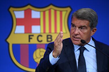 President of FC Barcelona Joan Laporta gestures during a press conference at the Camp Nou stadium in Barcelona on August 16, 2021.  - Joan Laporta explains the economic results of Due Diligence.  (Photo by LLUIS GENE  /  AFP)