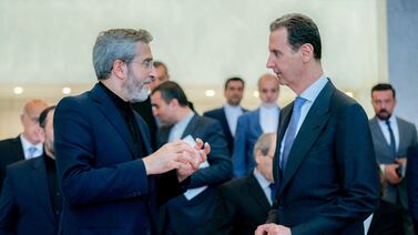 Iran's acting Foreign Minister Ali Bagheri, left, meets Syrian President Bashar Al Assad in Damascus. AFP