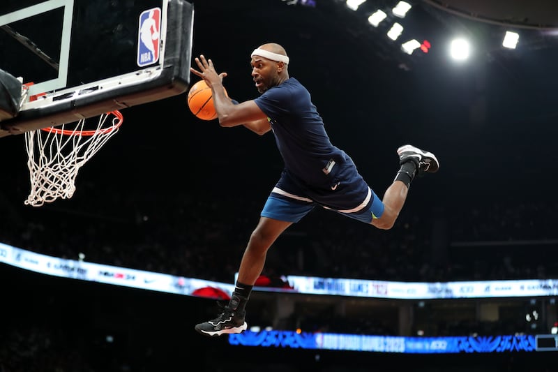 Trick shot artists perform during the game between the Minnesota Timberwolves and Dallas Mavericks in a pre-season NBA game as part of the Abu Dhabi Games 2023. Etihad Arena, Abu Dhabi. Chris Whiteoak / The National