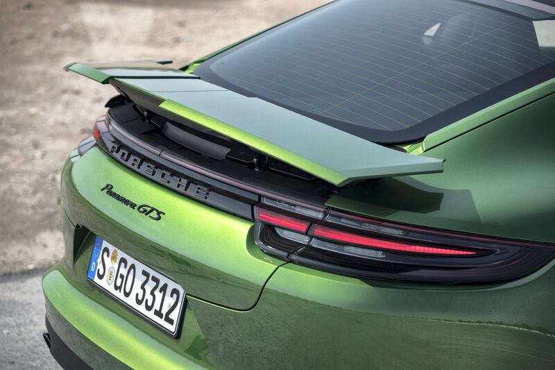 The adjustable rear spoiler. Porsche