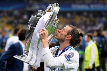KIEV, UKRAINE - MAY 26:  Gareth Bale of Real Madrid kisses the UEFA Champions League Trophy following his sides victory in the UEFA Champions League Final between Real Madrid and Liverpool at NSC Olimpiyskiy Stadium on May 26, 2018 in Kiev, Ukraine.  (Photo by Laurence Griffiths/Getty Images)