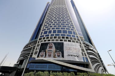 A sign on the side of Damac Towers in Dubai congratulates the Al Maktoum family on weddings of Sheikh Hamdan, Sheikh Maktoum and Sheikh Ahmed on Thursday. Chris Whiteoak / The National