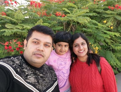 Sharjah residents Smrithi Raj, her husband - Vinod Kumar and five-year-old daughter Vismaya are among groups of Indians who have appealed to the Indian and UAE governments to ease entry approvals into the Emirates and increase flights from India. The family has been stuck in India since March and hope to return to the UAE soon. Courtesy: Smrithi Raj 