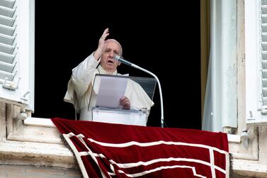 A handout photo made available by the Osservatore Romano shows Pope Francis leading the Angelus Mass from the window of his office overlooking Saint Peter's Square at the Vatican, 31 August 2020. EPA
