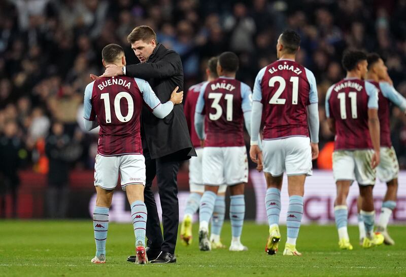 Aston Villa's Emiliano Buendia with manager Steven Gerrard following their win at Villa Park on Saturday. PA