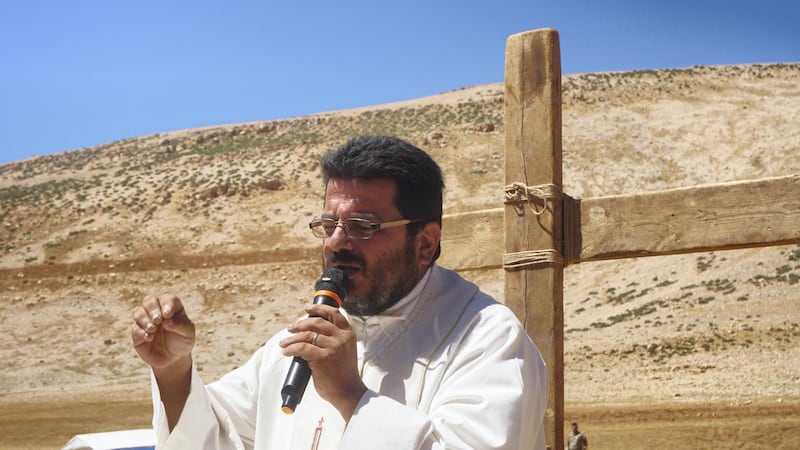 Priest Hani Tawk celebrates mass on Qornet Al Sawda, Lebanon, August 9, 2020. Photo by Aram Abdo