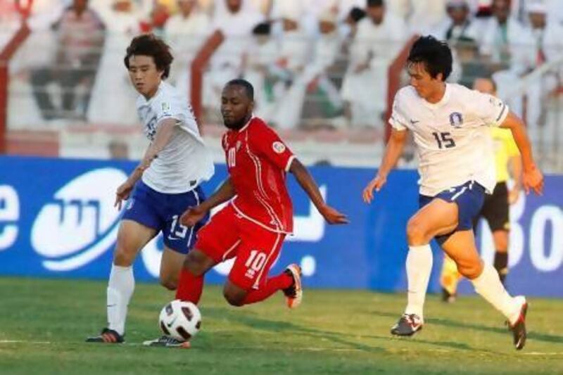 Ismail Matar and his UAE teammates, red, have improved in recent times but that run of form came too late from November 2011 when they lost to South Korea at home in the World Cup qualifiers. Mike Young / The National
