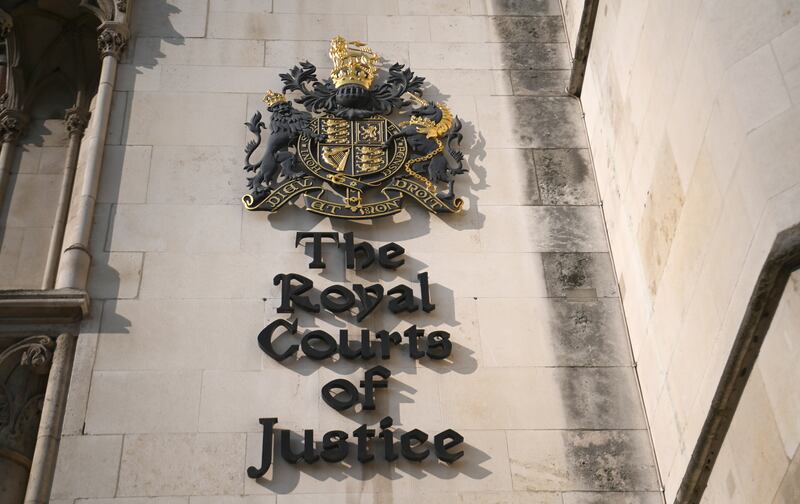 A general view of the Royal Courts of Justice in London. Inside the building, the High Court heard the 19-year-old refugee from Eritrea — only known as DM — supported his parents and five siblings in their applications to come to the UK. EPA