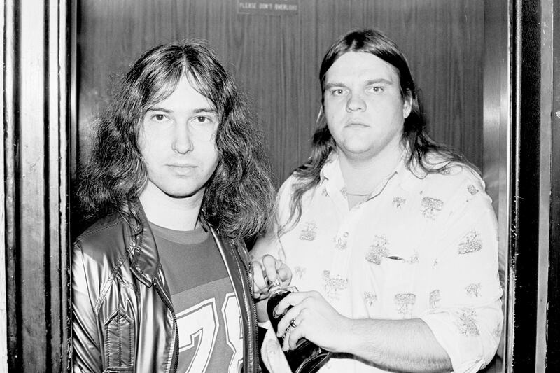 View of American musician, songwriter, and producer Jim Steinman (left) with musician Meat Loaf (born Marvin Lee Aday) as they stand in a doorway at a rehearsal loft, New York, New York, November 10, 1977. (Photo by Gary Gershoff/Getty Images)