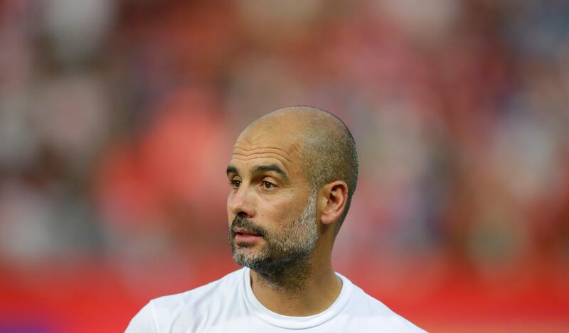 Manchester City's head coach Pep Guardiola looks on at the end of the Costa Brava trophy friendly soccer match between Girona and Manchester City at the Montilivi stadium in Girona, Spain, Tuesday, Aug. 15, 2017. (AP Photo/Manu Fernandez)