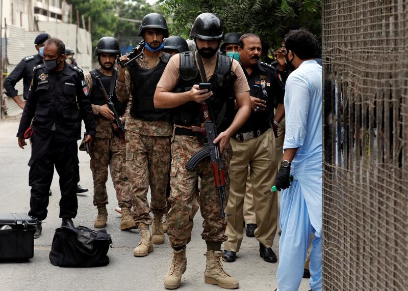 Paramilitary soldiers arrive at the site of an attack at the Pakistan Stock Exchange in Karachi June 29, 2020. REUTERS/Akhtar Soomro