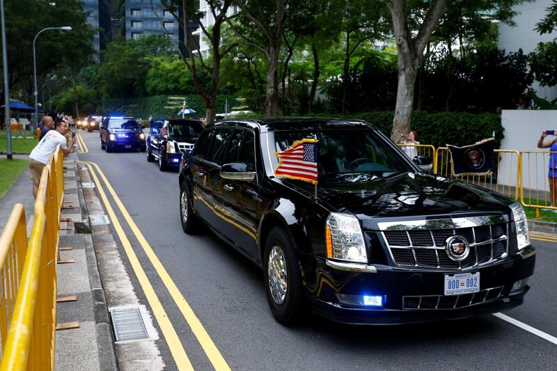 The motorcade of US President Donald Trump travels towards Sentosa for his meeting with North Korean leader Kim Jong Un. Feline Lim / Reuters