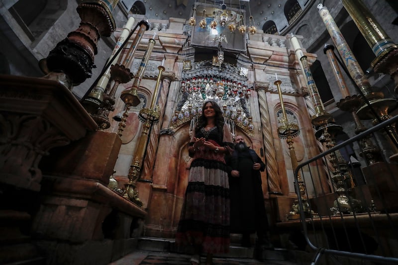 Meza visits the Jesus Tomb inside the Church of the Holy Sepulcher. EPA