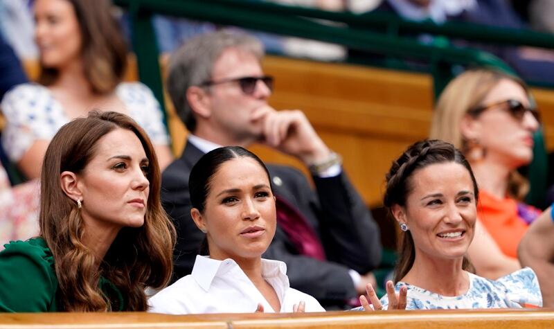 Catherine, the Duchess of Cambridge, Meghan Markle, the Duchess of Sussex and Pippa Middleton in the Royal Box on Centre Court during the Wimbledon Championships. Photo: EPA