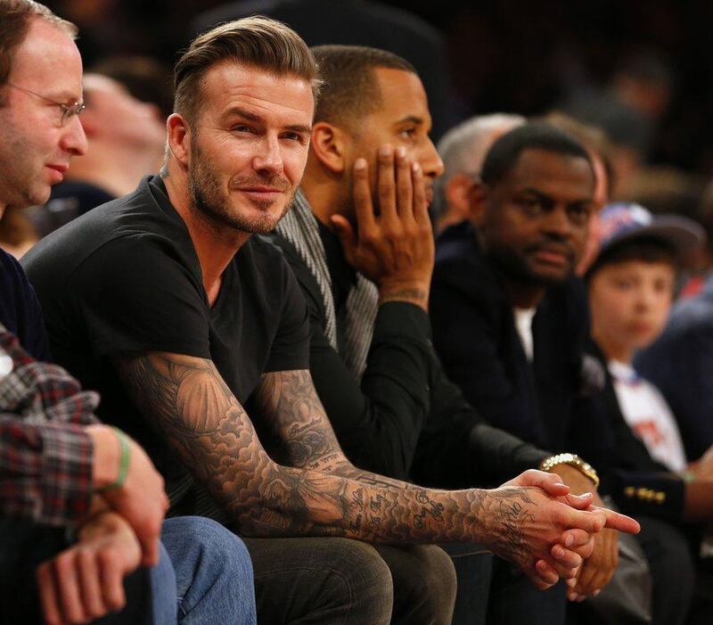 David Beckham's original Los Angeles Galaxy contract included a clause where he could buy an MLS franchise at a steeply discounted price, which he reportedly plans to do in Miami. Rich Schultz / Getty Images / AFP  