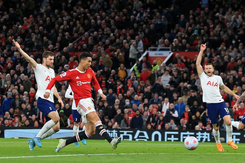 Manchester United's Cristiano Ronaldo scores against Tottenham Hotspur at Old Trafford. AFP