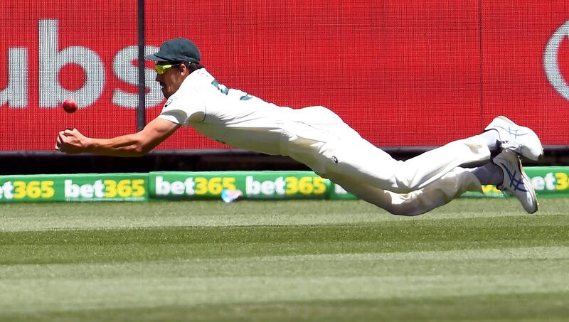 Australia's Mitchell Starc drops a shot from Indian batsman Ajinkya Rahane. AFP