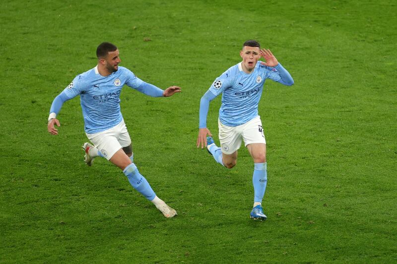 Phil Foden celebrates after scoring Manchester City's second goal against Borussia Dortmund in the Champions League quarter-final second leg at Signal Iduna Park on Wednesday, April 14. City won 2-1 on the night and 4-2 on aggregate. Getty