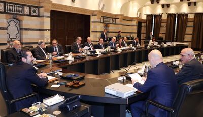 Handout pictures provided by the Lebanese photo agency Dalati and Nohra on October 17, 2019 shows Lebanese Prime Minister Saad Hariri (C) chairing a cabinet session at the Grand Serail in central Beirut.