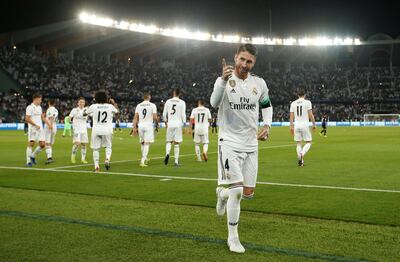 Soccer Football - Club World Cup - Final - Real Madrid v Al Ain - Zayed Sports City Stadium, Abu Dhabi, United Arab Emirates - December 22, 2018  Real Madrid's Sergio Ramos celebrates scoring their third goal  REUTERS/Andrew Boyers