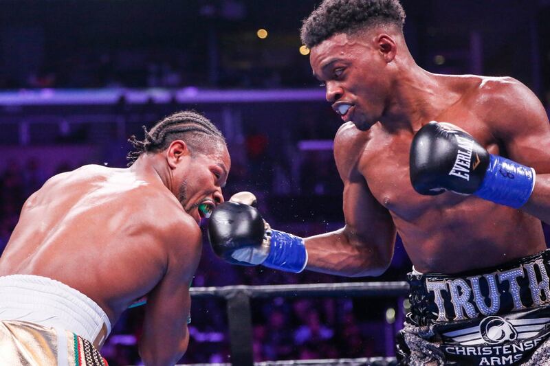 Errol Spence Jr lands a shot on Shawn Porter during their fight at the Staples Center. AP Photo