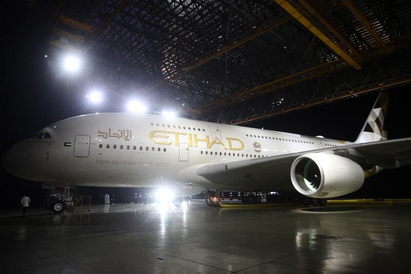 Etihad Airways’ first Airbus A380 with the Facets of Abu Dhabi livery. The Abu Dhabi carrier has an order for 10 A380s and will take delivery of four in 2015. Lee Hoagland / The National
