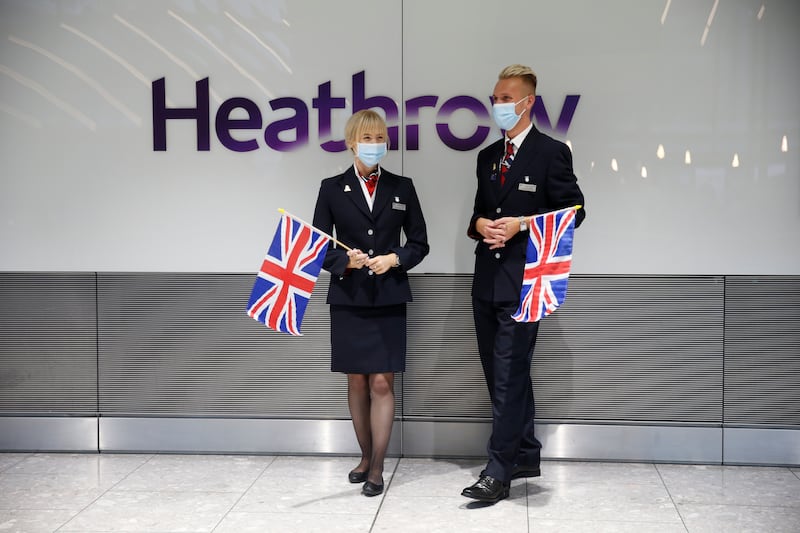 British Airways employees welcome Olympians returning from the Tokyo Olympics at Heathrow Airport in August 2021.
