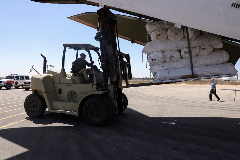 Aid from the UAE is unloaded in Benghazi. Reuters