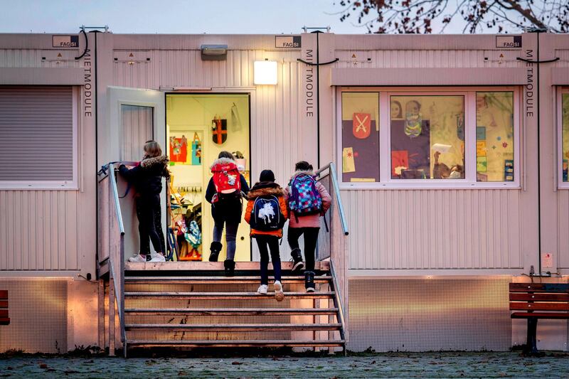 Pupils go to a school which is partially located in containers in Frankfurt, Germany. AP Photo