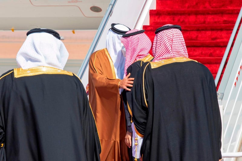 A handout picture provided by the Saudi Royal Palace on January 5, 2021, shows Crown Prince Mohammed bin Salman (C-R) welcoming Emir of Qatar Tamim bin Hamad Al-Thani (C-L) upon his arrival in the city of al-Ula in northwestern Saudi Arabia for the 41st Gulf Cooperation Council (GCC) summit. Saudi Arabia will reopen its borders and airspace to Qatar, US and Kuwaiti officials said, a major step towards ending a diplomatic rift that has seen Riyadh lead an alliance isolating Doha. The bombshell announcement came on the eve of GCC annual summit in the northwestern Saudi Arabian city of Al-Ula, where the dispute was already set to top the agenda. - RESTRICTED TO EDITORIAL USE - MANDATORY CREDIT "AFP PHOTO / SAUDI ROYAL PALACE / BANDAR AL-JALOUD" - NO MARKETING - NO ADVERTISING CAMPAIGNS - DISTRIBUTED AS A SERVICE TO CLIENTS
 / AFP / Saudi Royal Palace / BANDAR AL-JALOUD / RESTRICTED TO EDITORIAL USE - MANDATORY CREDIT "AFP PHOTO / SAUDI ROYAL PALACE / BANDAR AL-JALOUD" - NO MARKETING - NO ADVERTISING CAMPAIGNS - DISTRIBUTED AS A SERVICE TO CLIENTS
