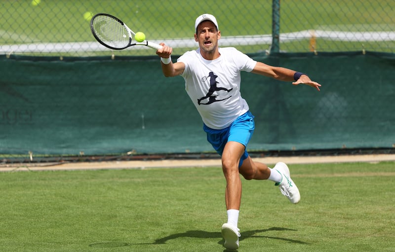 Novak Djokovic of Serbia plays a forehand during practice at the All England Club on June 26, 2022. Getty
