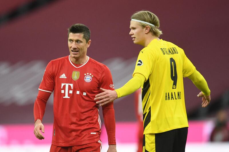 Bayern Munich's Polish forward Robert Lewandowski and Dortmund's Norwegian forward Erling Haaland in action. AFP