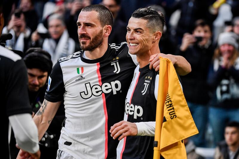 Cristiano Ronaldo celebrates with teammate Gonzalo Higuain, left, after scoring. AP