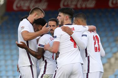 REYKJAVIK, ICELAND - SEPTEMBER 05: Raheem Sterling of England celebrates with his team mates after scoring his sides first goal from the penalty spot during the UEFA Nations League group stage match between Iceland and England at Laugardalsvollur National Stadium on September 05, 2020 in Reykjavik, Iceland. (Photo by Haflidi Breidfjord/Getty Images)