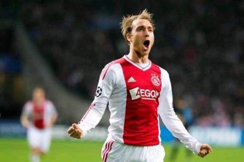 Christian Eriksen of Ajax celebrates after scoring the 3-1 against Manchester City in the Champions League clash on 24 October, 2012. Olaf Kraak / EPA
