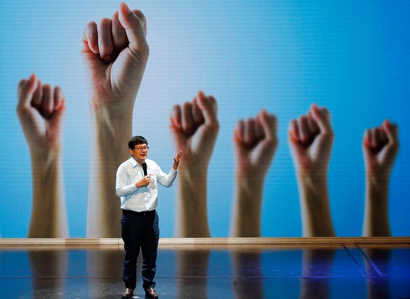 Anek Laothamathas, co-founder of the Action Coalition for Thailand (ACT) party, gives a speech during the first meeting of the party at Rangsit University in Bangkok, Thailand. Narong Sangak / EPA