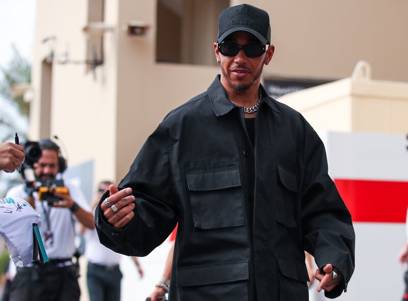 Lewis Hamilton arrives at Yas Marina Circuit on the final day  of the Abu Dhabi Grand Prix. Victor Besa / The National