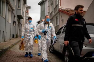 Turkish forensics officers at Santa Maria Church in Istanbul after the deadly shooting on Sunday. AP