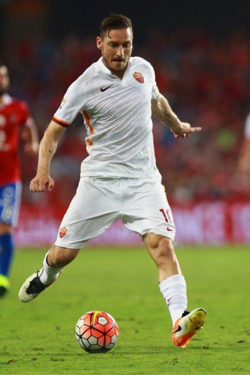 Roma’s captain Francesco Totti dribbles with the ball during the friendly football match between Egypt’s Al Ahly and Italy’s AS Roma on May 20, 2016 at Hazza bin Zayed Stadium in Al Ain. Nezar Balout / AFP