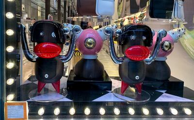 Window display at Prada, with the now removed "Otto" figures. Courtesy Prada