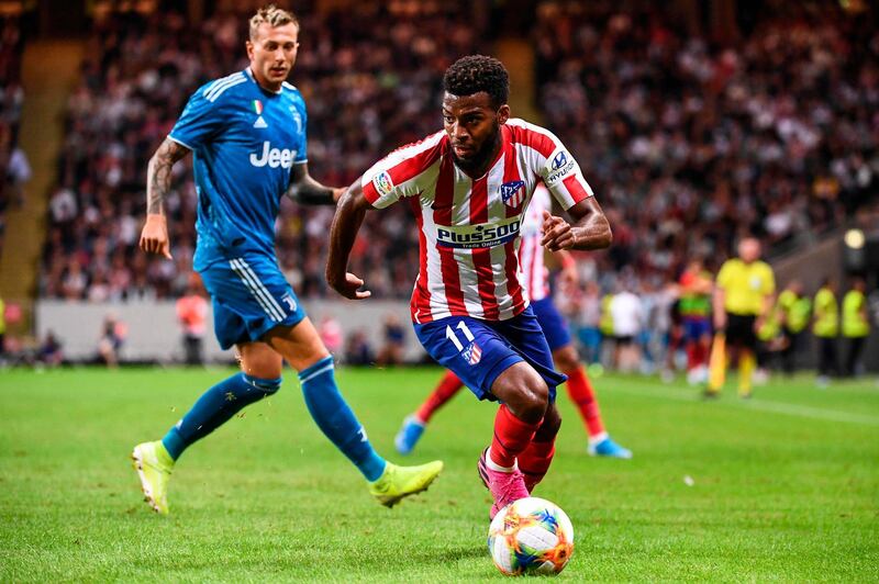 Atletico Madrid's midfielder Lemar controls the ball. AFP