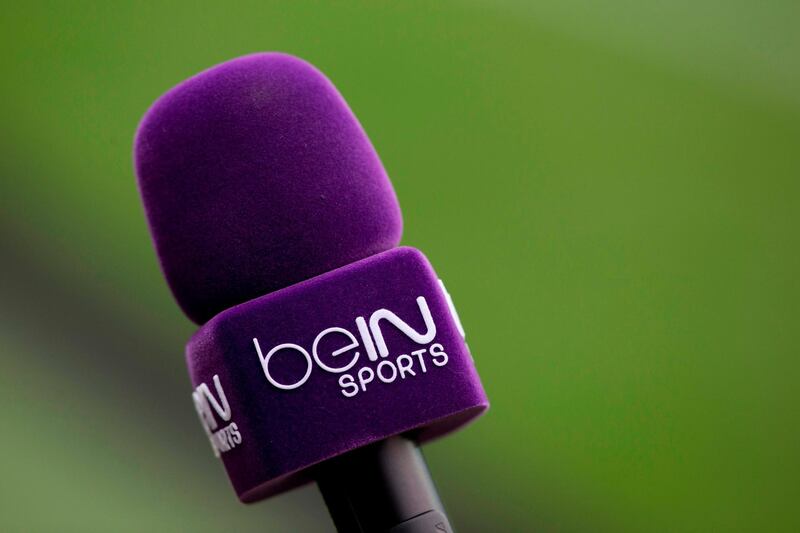 (FILES) This file picture taken on December 19, 2015 shows a microphone labelled with bein sports TV logo prior to the European Rugby Champions Cup match beetween Stade Francais Paris and Treviso, at Jean Bouin stadium in Paris. Like it or not, Egypt is having to resort to pricey beIN subscriptions to watch the national team, The Pharaohs, play in the World Cup for the first time in 28 years. / AFP / KENZO TRIBOUILLARD
