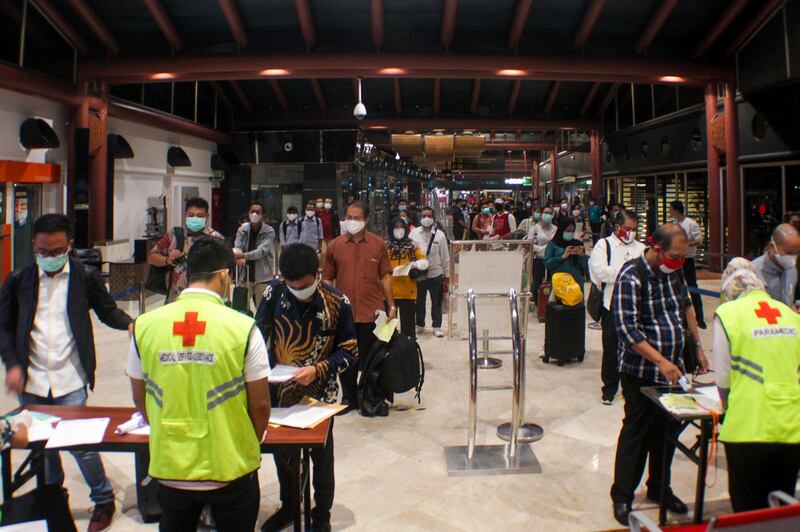 Airport health officials at a check point at Soekarno-Hatta Jakarta International airport in Tangerang. AFP