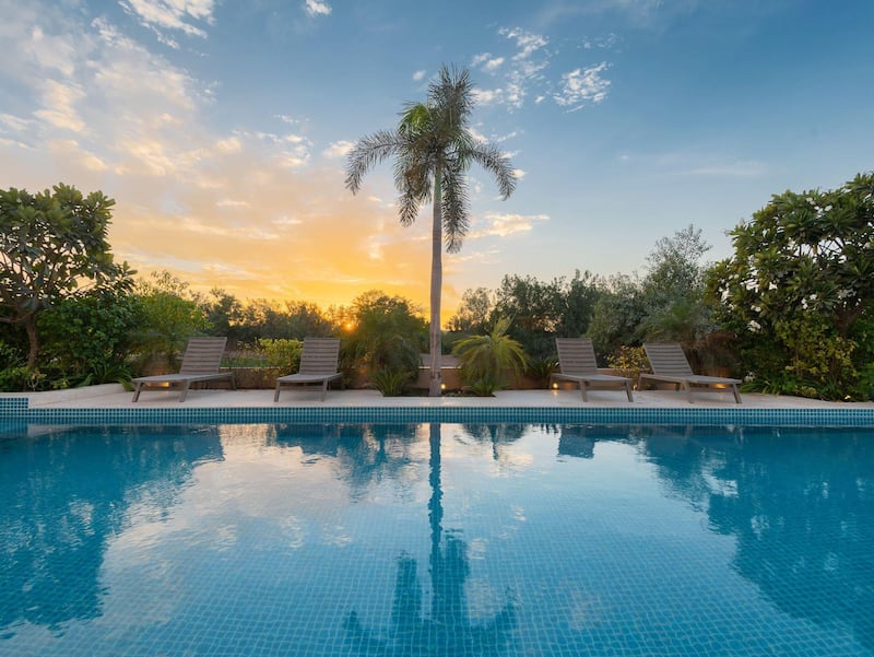 One of the property's two swimming pools. Courtesy Luxhabitat Sotheby's International Realty