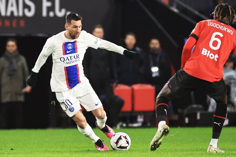 Paris Saint-Germain's Lionel Messi in action against Rennes's Lesley Ugochukwu. EPA