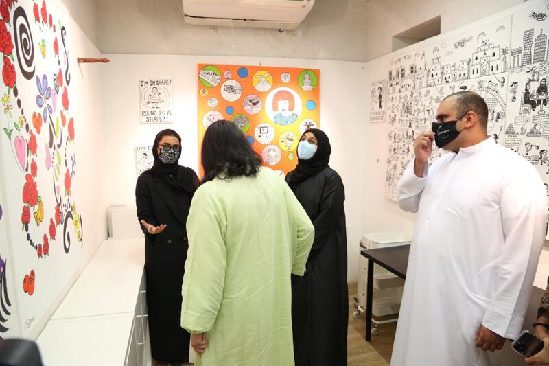 Noura Al Kaabi, the Minister of Culture and Youth and Hessa Buhumaid, the Minister of Community Development, are shown around a studio space by Emirati artists Abdullah Lutfi and Asma Baker who found a new place to work at Tashkeel in Dubai’s Al Fahidi historical district. Courtesy: Next Chapter