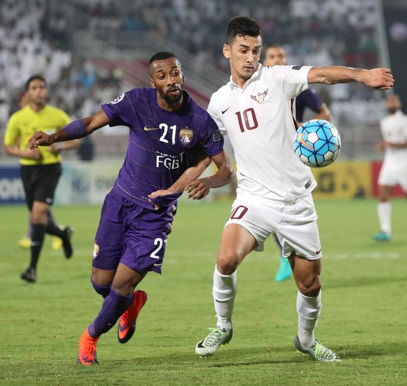 El Jaish's Sardor Rashidov, right, during the Asian Champions League match against Al Ain on October 18, 2016. AFP