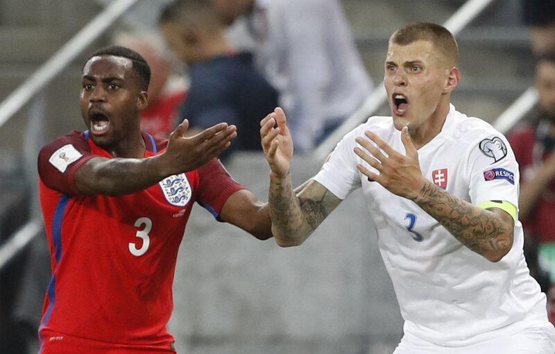 England's Danny Rose and Slovakia’s Martin Skrtel reacts after fouling England’s Harry Kane resulting in being sent off during the European World Cup qualifying match. Carl Recine / Action Images / Reuters