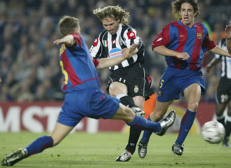 BARCELONA - APRIL 22:  Pavel Nedved of Juventus scores the first goal during the UEFA Champions League Quarter-Final second leg match between Barcelona and Juventus at the Nou Camp Stadium on April 22, 2003 in Barcelona, Spain. (Photo by Alex Livesey/Getty Images)