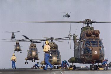 In this August 28, 1990 photo, helicopters land on the deck of the French aircraft carrier Clemenceau, casting off Djibouti, as French army was deployed in the Persian Gulf since Iraq's invasion of Kuwait on August 2. AFP